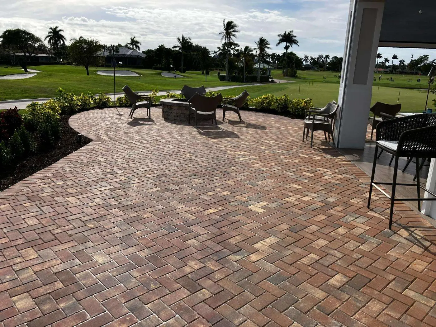 Paver patio installed beside a Southwest Florida golf course