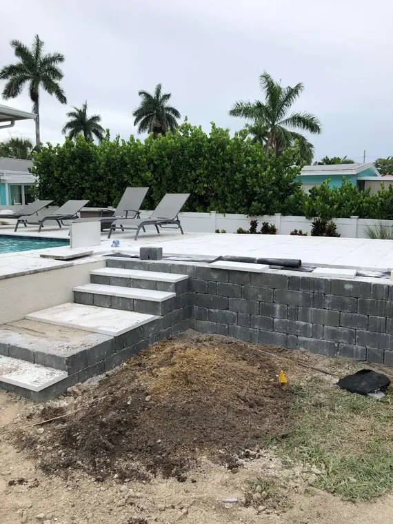 Pool deck and step renovation with light pavers